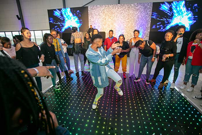 dancing employees at a corporate event.